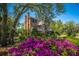 Charming brick home featuring a inviting front yard with blooming azaleas at 1521 Hurtes Island Dr, Charleston, SC 29407