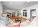 Bright living room with a fireplace and a view to the outside at 1521 Hurtes Island Dr, Charleston, SC 29407