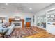 Inviting living room with a modern fireplace, bright interior and built in shelving at 1521 Hurtes Island Dr, Charleston, SC 29407