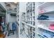 Well-organized walk-in closet features custom shelving for shoes, clothing, and accessories at 1521 Hurtes Island Dr, Charleston, SC 29407