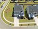 Aerial view of a charming home with a well-maintained yard and attractive landscaping in a desirable neighborhood at 158 Woodland Oak Way, Summerville, SC 29485