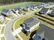 Expansive aerial view of a residential area with well-maintained homes and a scenic pond at 158 Woodland Oak Way, Summerville, SC 29485