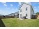 Large backyard with a patio, outdoor seating, grill, and privacy fence at 158 Woodland Oak Way, Summerville, SC 29485
