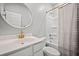 Clean bathroom featuring a modern vanity, mirror, and shower/tub combo at 158 Woodland Oak Way, Summerville, SC 29485