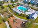 Aerial view of a community pool with seating and a playground nearby at 158 Woodland Oak Way, Summerville, SC 29485