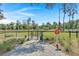 Dog park featuring a gated entrance, picnic table and green space for community residents at 158 Woodland Oak Way, Summerville, SC 29485