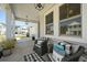 Inviting front porch featuring comfortable seating and an open view at 158 Woodland Oak Way, Summerville, SC 29485