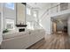 Bright, open living room with hardwood floors, a fireplace, and a staircase at 158 Woodland Oak Way, Summerville, SC 29485