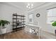 Well-lit office with a modern desk, shelving, and large window at 158 Woodland Oak Way, Summerville, SC 29485