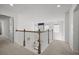 Upstairs hallway with open view to living room below at 158 Woodland Oak Way, Summerville, SC 29485