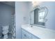 Charming bathroom featuring a stylish mirror, modern vanity, and a shower with tub combination at 161 Ryefield Ln, Ridgeville, SC 29472