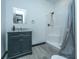Cozy bathroom with a modern vanity, framed mirror, and a functional shower with tiled floors at 161 Ryefield Ln, Ridgeville, SC 29472