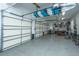 Spacious three-car garage offering ample parking and storage space for vehicles and equipment at 161 Ryefield Ln, Ridgeville, SC 29472