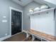 Convenient mudroom featuring built-in storage, bench, and hooks, perfect for organizing outdoor essentials at 161 Ryefield Ln, Ridgeville, SC 29472