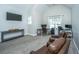 Home office with vaulted ceiling, comfortable seating, and ample space for productivity at 161 Ryefield Ln, Ridgeville, SC 29472