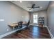 Spacious home office with built-in desk and ample natural light, perfect for productivity at 161 Ryefield Ln, Ridgeville, SC 29472