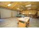 The interior of this building showcases a well-equipped workspace with a kayak and ample lighting at 161 Ryefield Ln, Ridgeville, SC 29472