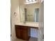 Bathroom featuring large mirror, modern vanity and under cabinet storage at 1659 Seabago Dr, Charleston, SC 29414