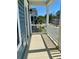 Relaxing front porch with white railing and plenty of space for outdoor seating at 1659 Seabago Dr, Charleston, SC 29414