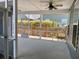 Enclosed and screened outdoor porch with ceiling fans and privacy from the neighbors at 1659 Seabago Dr, Charleston, SC 29414