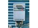 Wall mounted Rheem Prestige tankless water heater on blue siding with visible connections at 1659 Seabago Dr, Charleston, SC 29414