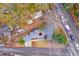 An aerial view displays the home's roof, yard, driveway, and proximity to nearby streets at 1706 W Avalon Cir, Charleston, SC 29407