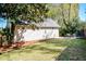 Large backyard with a patio, fence, and ample room to relax at 1706 W Avalon Cir, Charleston, SC 29407