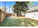 Large backyard featuring a privacy fence and shade trees, ideal for outdoor activities at 1706 W Avalon Cir, Charleston, SC 29407