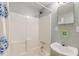This well-maintained bathroom features a shower/tub combination and a simple sink vanity with a mirror at 1706 W Avalon Cir, Charleston, SC 29407