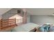 Unique bedroom with wood-paneled walls, creating a cozy and rustic atmosphere with built-in storage at 1706 W Avalon Cir, Charleston, SC 29407