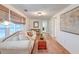 Cozy living room featuring hardwood floors, a sofa and a view to the dining area at 1706 W Avalon Cir, Charleston, SC 29407