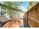 Home's side yard with a view of the home and surrounding fence, suitable for walkways at 1706 W Avalon Cir, Charleston, SC 29407