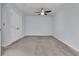 This bedroom has light blue walls, carpet flooring and a ceiling fan with light fixture at 1808 Chauncys Ct, Mount Pleasant, SC 29466