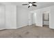 This bedroom has carpet flooring, light blue walls, a ceiling fan and a closet at 1808 Chauncys Ct, Mount Pleasant, SC 29466