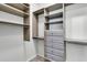 Spacious walk-in closet featuring custom shelving, drawers, and hanging racks at 1808 Chauncys Ct, Mount Pleasant, SC 29466