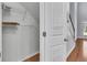 Walk-in closet with wire shelving for organized storage with hardwood floors at 1808 Chauncys Ct, Mount Pleasant, SC 29466