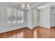 Elegant dining room with plantation shutters, and hardwood floors at 1808 Chauncys Ct, Mount Pleasant, SC 29466