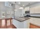 Open kitchen featuring a center island, stainless appliances, and hardwood floors at 1808 Chauncys Ct, Mount Pleasant, SC 29466