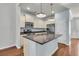Modern kitchen with stainless steel appliances, granite countertops, and island sink at 1808 Chauncys Ct, Mount Pleasant, SC 29466