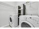 Laundry room with updated, modern appliances and wire shelving at 1808 Chauncys Ct, Mount Pleasant, SC 29466