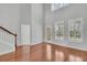 Bright living room with hardwood floors, plantation shutters, and soaring ceilings at 1808 Chauncys Ct, Mount Pleasant, SC 29466