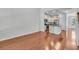 Spacious living space featuring hardwood floors, and a modern kitchen with an island at 1808 Chauncys Ct, Mount Pleasant, SC 29466