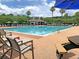 Community swimming pool with ample seating and shaded pergola, perfect for relaxing at 1808 Chauncys Ct, Mount Pleasant, SC 29466
