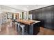 Spacious kitchen island featuring barstool seating and access to a modern kitchen with stainless appliances at 1810 Fleming Woods Rd, Charleston, SC 29412