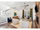 Inviting living room with a cozy atmosphere, showcasing plush seating, a fireplace, and modern decor at 1810 Fleming Woods Rd, Charleston, SC 29412