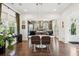 Beautiful open-concept layout connecting dining and kitchen areas with modern finishes and natural lighting at 1810 Fleming Woods Rd, Charleston, SC 29412