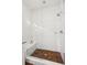 Modern shower with a glass surround, bench seating, and contrasting tile design at 1810 Fleming Woods Rd, Charleston, SC 29412