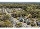 Aerial view of a neighborhood showcasing the layout and proximity to green spaces and community amenities at 1826 Towne St, Johns Island, SC 29455