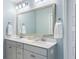 Bathroom featuring double sinks, a large mirror, and plenty of counter space at 1826 Towne St, Johns Island, SC 29455