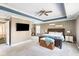 Spacious primary bedroom with decorative tray ceiling and ample natural light at 1826 Towne St, Johns Island, SC 29455